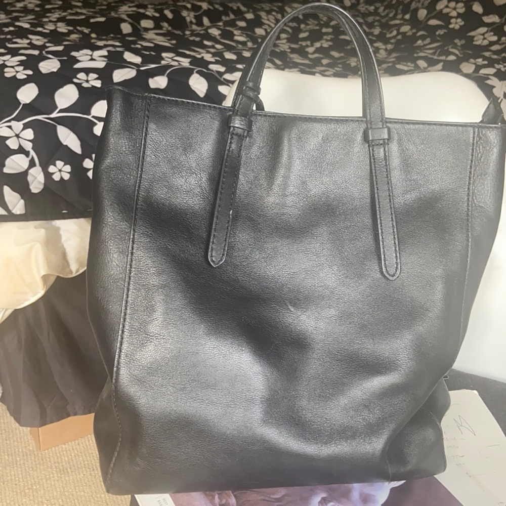 like new Fossil convertible backpack in black.